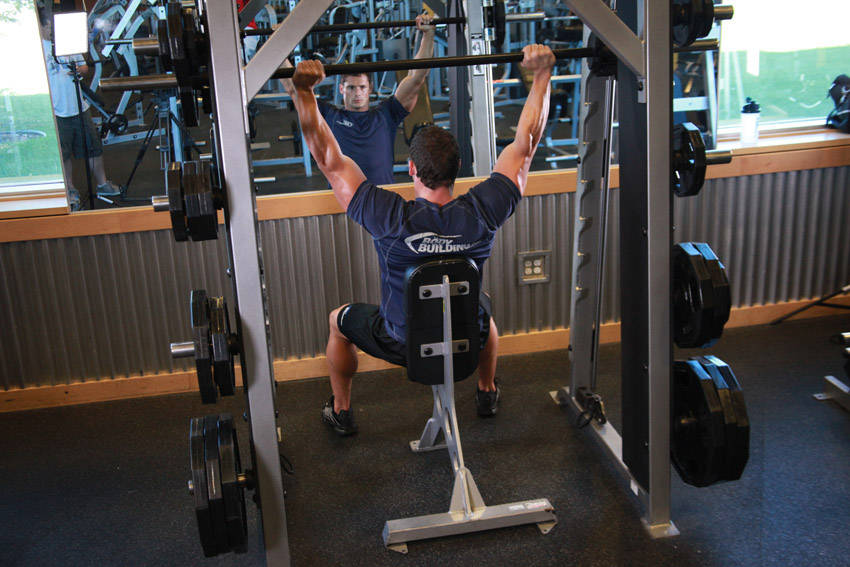 Smith Machine Overhead Shoulder Press — demonstration image 2