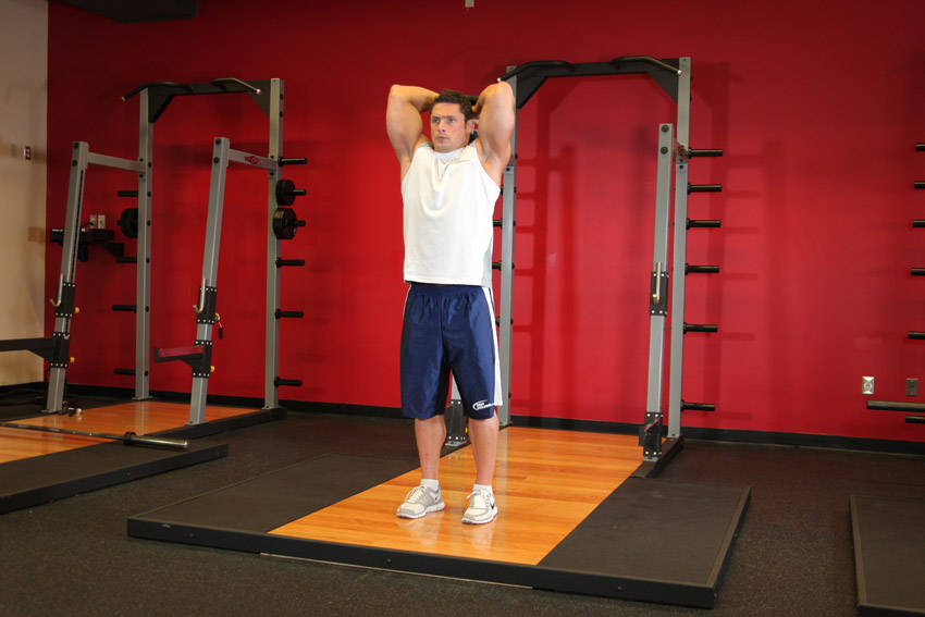 Standing Dumbbell Triceps Extension — demonstration image 2